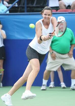 Lindsay Davenport (USA) returns a serve as a member of the St. Louis Aces during their match against the Sacramento Capitals in World Team Tennis matches at the Dwight Davis Tennis Center in St. Louis on July 7, 2010.  SLP2010070707