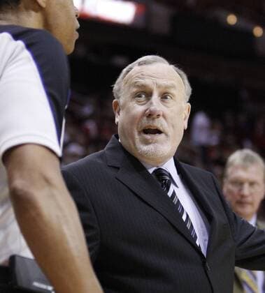 April 03, 2011: Houston Rockets head coach Rick Adelman speaks to a referee during the first half of the NBA basketball game between the Atlanta Hawks and the Houston Rockets at the Toyota Center in Houston, TX. - ZUMAc04