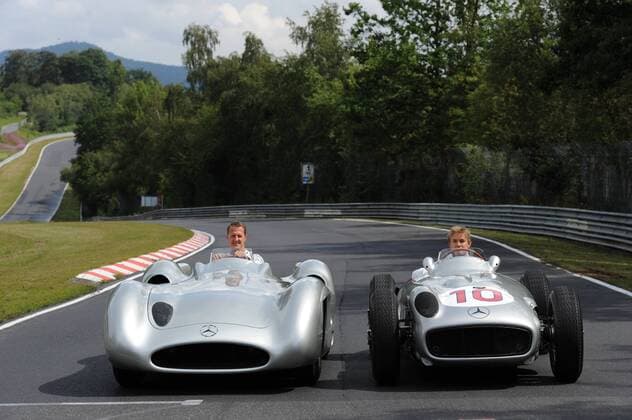 (L to R): Michael Schumacher (GER) Mercedes GP with the Mercedes W196 Streamliner and Nico Rosberg (GER) Mercedes GP in the Merecdes W196 Formule 1 : Preparation - Grand Prix d allemagne - GP Nurburgring - 21.07.2011 BernardAsset - 