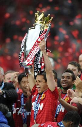 Javier Hernandez of Manchester United lifts the Premier League trophy - Barclays Premier League - Manchester United ManU - Old Trafford Stadium - Manchester - England - 12 05 13 - EDITORIAL USE ONLY. No use with unauthorised audio, video, data, fixture lists, club league logos or live services. Online in-match use limited to 120 images, no video emulation. No use in betting, games or single club league player publications.