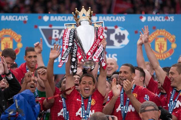 Football - Premier League 2012 2013 - Manchester United ae Javier Hernandez of Manchester United holds aloft the trophy at Old Trafford 