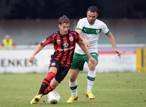 19.07.2013, xjhx, Fussball Testspiel, Eintracht Frankfurt - Bursaspor , v.l. Stefano Celozzi (Eintracht Frankfurt), Musa Cagiran (Bursaspor)