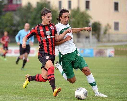 19.07.2013, xjhx, Fussball Testspiel, Eintracht Frankfurt - Bursaspor , v.l. Stefano Celozzi (Eintracht Frankfurt), Tuncay Sanli (Bursaspor)