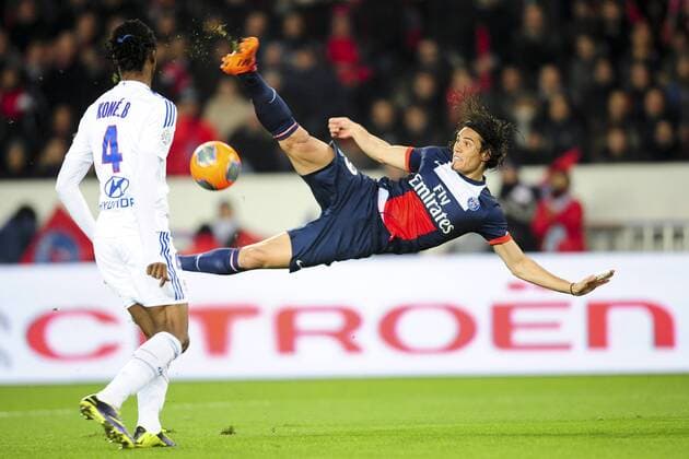 Edinson Cavani (PSG) VS Bakari Kone (OL) FOOTBALL : PSG vs OL - L1 - 01 12 2012 JBAutissier Panoramic 