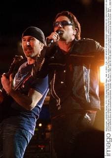 Feb. 3, 2002 - U.S. - KRT SPORTS STORY SLUGGED: SUPERBOWL KRT PHOTOGRAPH BY SEAN LOFTIN BILOXI SUN HERALD (February 3) NEW ORLEANS, LA - Bono, right, and The Edge, members of the band U2, perform during the Super Bowl XXXVI halftime show at the Louisiana Superdome, Sunday, February 3, 2002. (BI) NC KD BL 2002 (Vert) (Digital image) (smd) News Archive - Feb. 3, 2002 - ZUMAm67