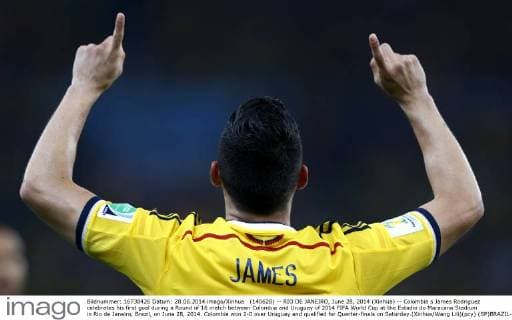 (140628) -- RIO DE JANEIRO, June 28, 2014 (Xinhua) -- Colombia s James Rodriguez celebrates his first goal during a Round of 16 match between Colombia and Uruguay of 2014 FIFA World Cup at the Estadio do Maracana Stadium in Rio de Janeiro, Brazil, on June 28, 2014. Colombia won 2-0 over Uruguay and qualified for Quarter-finals on Saturday.(Xinhua Wang Lili)(pcy) (SP)BRAZIL-RIO DE JANEIRO-WORLD CUP 2014-ROUNG OF 16-COLOMBIA VS URUGUAY 