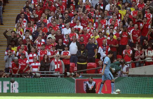 FA Community Shield - Arsenal v Manchester City . . Wembley, Middlesex, UK . . 10.08.2014 Arsenal fans give Samir Nasri (MC) some stick.