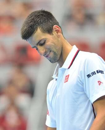 (141003) -- BEIJING, Oct. 3, 2014 -- Novak Djokovic of Serbia reacts during the men s quarterfinal match at the China Open tennis tournament in Beijing, China, Oct. 3, 2014. (SP)CHINA-BEIJING-TENNIS-CHINA OPEN LixWen