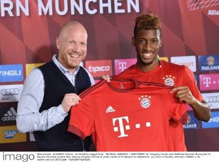 MUNICH, GERMANY - SEPTEMBER 10: Kingsley Coman and Matthias Sammer during the FC Bayern München Unveils New Signing Kingsley Coman at press center of FC Bayern on September 10, 2015 in Munich, Germany
