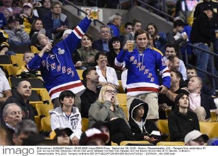 September 24, 2015 - Boston, Massachusetts, U.S. - Rangers fans celebrate a NY goal during the NHL Eishockey Herren USA game between the New York Rangers and the Boston Bruins held at TD Garden, in Boston, Massachusetts. NHL 2015: Rangers vs Bruins SEP 24 - ZUMAc04_