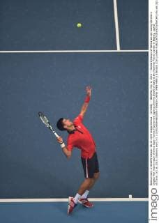 (151006) -- BEIJING, Oct. 6, 2015 -- Novak Djokovic of Serbia serves during the men s singles first round match of China Open Tennis Tournament against Simone Bolelli of Italy at the National Tennis Center in Beijing, capital of China, Oct. 6, 2015. Djokovic won 2-0. ) (SP)CHINA-BEIJING-TENNIS-CHINA OPEN-MEN S SINGLES (CN) LixWen