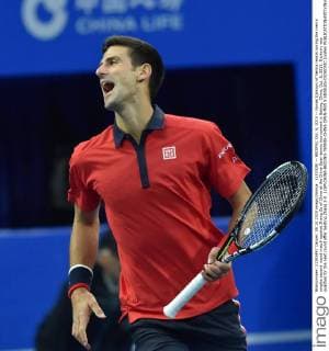 (151008) -- BEIJING, Oct. 8, 2015 -- Novak Djokovic of Serbia reacts during the men s singles second round match against Zhang Ze of China at the China Open tennis tournament in Beijing, China, Oct. 8, 2015. Djokovic was qualified for the next round after beating Zhang 2-0. ) (SP)CHINA-BEIJING-TENNIS-CHINA OPEN-MEN S SINGLES-DJOKOVIC LixWen