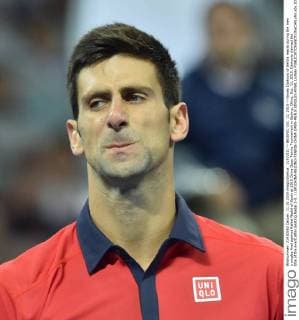 (151011) -- BEIJING, Oct. 11, 2015 -- Novak Djokovic of Serbia reacts during the men s singles final against Rafael Nadal of Spain at 2015 China Open Tennis Tournament in Beijing, China, Oct. 11, 2015. Djokovic claimed the title of the event after beating Nadal 2-0. ) (SP)CHINA-BEIJING-TENNIS-CHINA OPEN-MEN S SINGLES-FINAL LixWen