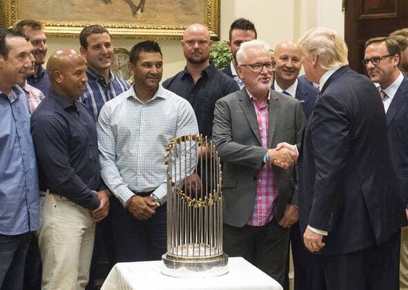 President Donald Trump shakes hands with Chicago Cubs Manager Joe Maddon as he meets with the 2016 World Series champion Chicago Cubs in the Oval Office at the White House on Washington, D.C. on June 28, 2017. WAP20170628322 KEVINxDIETSCH