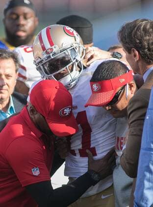 December 31, 2017 - Los Angeles, California, U.S - 11 Marquise Goodwin, WR of the San Francisco 49ers is help up after sustaining a concussion on a tackle by 24 Blake Countess, DB, of the Los Angeles Rams on Sunday December 31, 2017 at the L.A. Coliseum in Los Angeles, California. Rams lose to 49ers, 34-13. Rams lose to 49ers, 34-13 - ZUMAp124 20171231_zaa_p124_022 Copyright: xJavierxRojasx