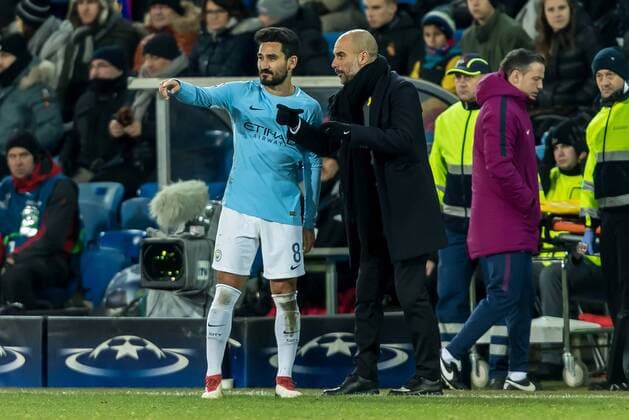 Basel Switzerland 13 02 2018 UEFA Champions League 2017 18 season last finals FC Basel Manchester City coach Josep Guardiola MNC speaks with Ilkay Gündogan MNC DeFodi507