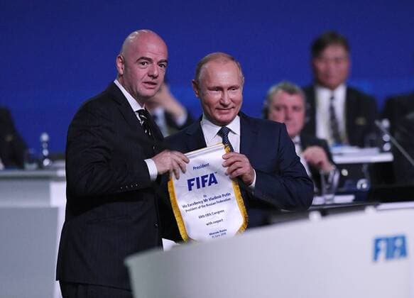 Football International FIFA Congress 2018 in Moscow 13 06 3018 FIFA President Gianni Infantino li Switzerland hands over a pennant to Russian President Vladimir Putin