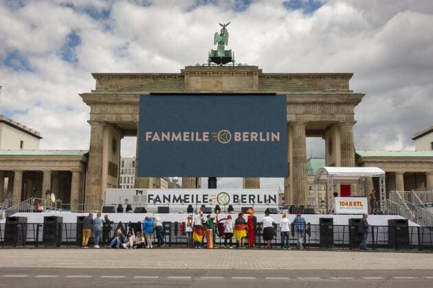 The stage on the fan mile for the football World Cup at the Brandenburg Gate on the street of June 17 in Berlin Tiergarten Photo Volker Hohlfeld WM fan mile Berlin