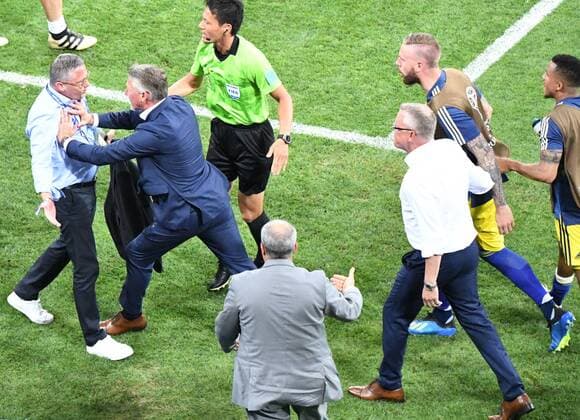 Soccer Mens Season 2017 18 World Cup in Russia Group F 2 Gameday Olympic Stadium Sochi Germany Sweden Georg Behlau l Head of the office of the German national team ran after the whistle from the German bank in front of the Swedish and cheered demonstratively following there was scramble between two camps the German official splashed and shoved 3 rd right coach Janne Andersson Sweden 23 06 2018 Copyright: xMatthiasxKochx
