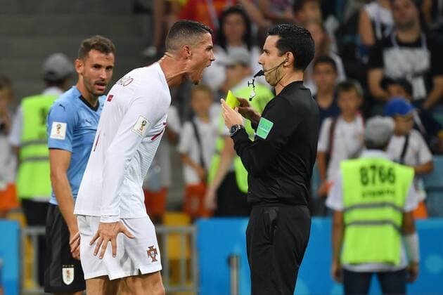 Enraged Cristiano RONALDO POR barks at referee Cesar RAMOS and receives a yellow card Anger Uruguay URU Portugal POR 2 1 Round of 16 Match 49 on 30 06 2018 in SOCHI Fisht Olympic Stadium Football World Cup 2018 in Russia from 14 06 15 07 2018