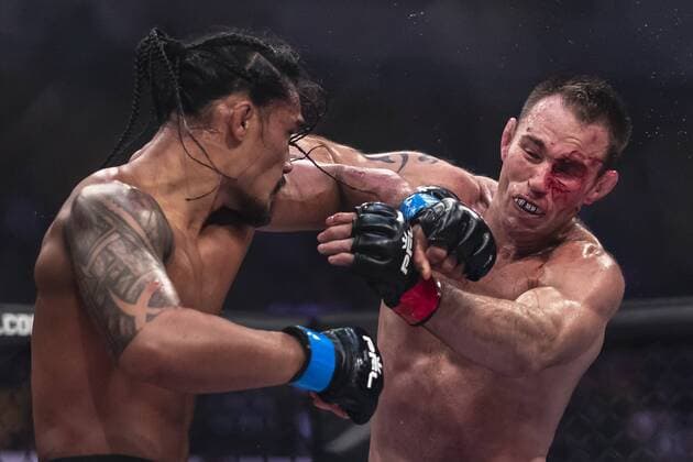 July 05, 2018 - Washington, District of Columbia, U.S. - JAKE SHIELDS gets hit by RAY COOPER III at left, during their welterweight fight at the Charles E. Smith Center at George Washington University in Washington, District of Columbia. Cooper defeated Shields by TKO. MMA 2018: Professional Fighters League in Washington - ZUMAc04_ 20180705_zaf_c04_112 Copyright: xScottxTaetschx