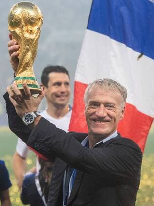 180715 Head coach Didier Deschamps of France celebrates with the trophy after winning the FIFA World Cup final match between France and Croatia on July 15, 2018 in Moscow Photo Petter Arvidson BILDBYRAN Code PA 92087  Copyright: PETTERxARVIDSON BB180715PA329
