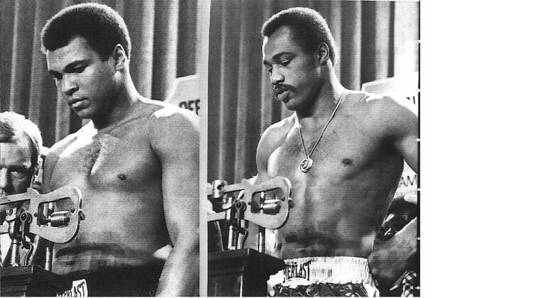 NEW YORK ---- HEAVYWEIGHT CHAMP MUHAMMAD ALI (LEFT AT 221 POUNDS) AND CHALLENGER KEN NORTON (RIGHT 217-1 2 POUNDS) WEIGHT IN 28 09 FOR THEIR TITLE BOUT AT YANKEE STADIUM. .EP WST BELGA.  x85106619stx