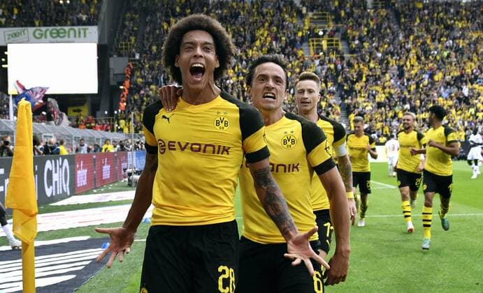 Soccer Bundesliga Germany Men Season 2018 2019 1 Gameday Signal Iduna Park Dortmund Bor Dortmund BVB yellow RB Leipzig white Jubilation Axel Witsel BVB after his goal to 3 1 together with Thomas Delaney BVB Cheers Joy Action DFL REGULATIONS PROHIBIT ANY USE OF PHOTOGRAPH AS IMAGE SEQUENCES AND OR QUASI VIDEO