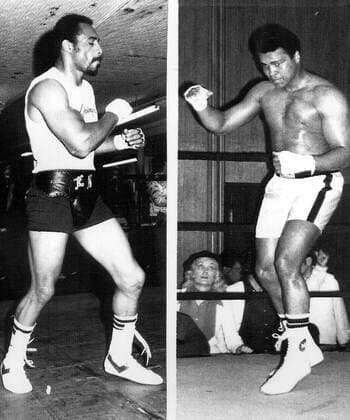 CHALLENGER KEN MORTON (L) AND HEAVYWEIGHT CHAMPION MUHAMMAD ALI (R), SHOWN WORKING OUT AT THEIR UPSTATE CAMPS LAST WEEK,WILL MEET IN NEW-YORK S YANKEE STADIUM 9 28, WITH ALI S TITLE ON THE LINE. ALI LOST TO NORTON IN 1973 SUFFERING A BROKEN JAW DURING THE BOUT. .HPT WST BELGA  x85193319stx