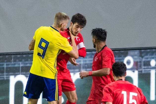 180911 Swedens Anton Saletros takes control of Turkeys Melih Okutan during the European Championships in football between Sweden and Turkey on September 11, 2018 in Helsingborg  Copyright: PETTERxARVIDSON BB180911PA028