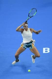 (181002) -- BEIJING , Oct. 2, 2018 -- Aryna Sabalenka of Belarus hits a return during the women s singles second round match against Garbine Muguruza of Spain at China Open tennis tournament in Beijing, China, Oct. 2, 2018. Aryna Sabalenka won 2-0. ) (SP)CHINA-BEIJING-TENNIS-CHINA OPEN-WOMEN S SINGLES (CN) JuxHuanzong