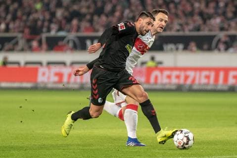 Vincenzo Grifo SC Freiburg and Christian Gentner VfB Stuttgart Germany Stuttgart 03 02 2019 BuLi VfB Stuttgart vs SC Freiburg Mercedes Benz Arena DFL DFB REGULATIONS PROHIBIT ANY USE OF PHOTOGRAPHS AS IMAGE SEQUENCES AND OR QUASI VIDEO