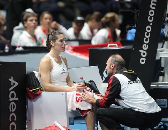 Andrea Petkovic GER cries on the right Team captain Jens Gerlach GER