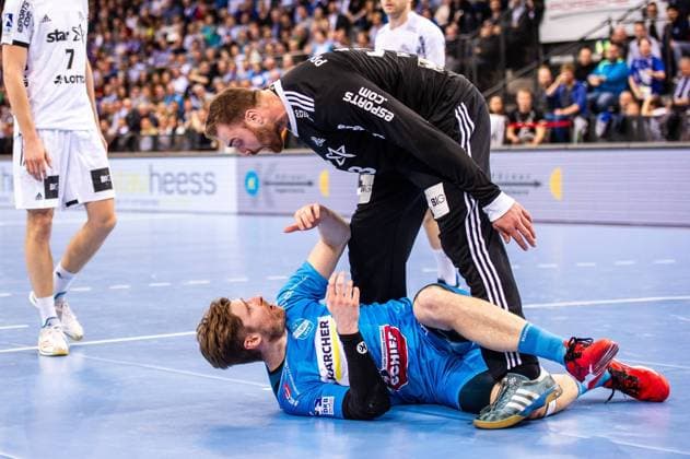 TVB 1898 Stuttgart THW Kiel Schimmelbauer Tobias TVB 1898 Stuttgart 2 Wolff Andreas THW Kiel 33 at the match in the Handball Bundesliga TVB 1898 Stuttgart THW Kiel Stuttgart 21 03 19 Handball 25 Matchday Baden Wuerttemberg Germany