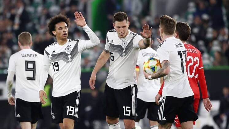 Germany Serbia Football international Wolfsburg 20 03 2019 Volkswagen Arena Football international BR Germany GER vs Serbia SRB 1 1 0 1 Im Bild v l Leroy Sane 19 GER ManCity Niklas Süle Suele 15 GER FC Bayern und Marco Reus 11 GER Dortmund DFB regulations prohibit any use of photographs as image sequences and or quasi video