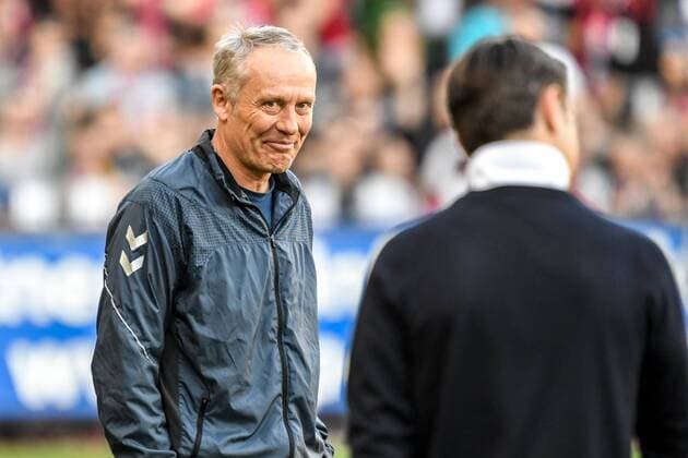 Soccer Bundesliga 18 19 SC Freiburg vs. FC Bayern Muenchen 30 03 2019 Christian Streich SC Freiburg coach smiles at Niko Kovac FC Bayern Muenchen head coach at soccer Bundesliga match between SC Freiburg and FC Bayern Muenchen on Saturday 30 March 2019 at the Schwarzwald Stadium in Freiburg im Breisgau DFL REGULATIONS PROHIBIT ANY USE OF PHOTOGRAPHS AS IMAGE SEQUENCES AND OR QUASI VIDEO BEAUTIFUL SPORTS Gerd Gruendl xGRGx