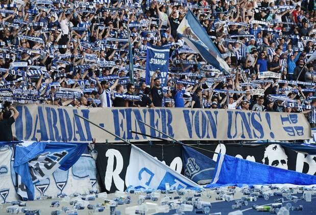 The Hertha fans from the Ostkurve show a banner with the stroke Dardai One of us football 1 Bundesliga season 2018 2019 30 matchday Hertha BSC Berlin Hannover 96 in the Olympiastadion in Berlin Germany on 21 04 2019