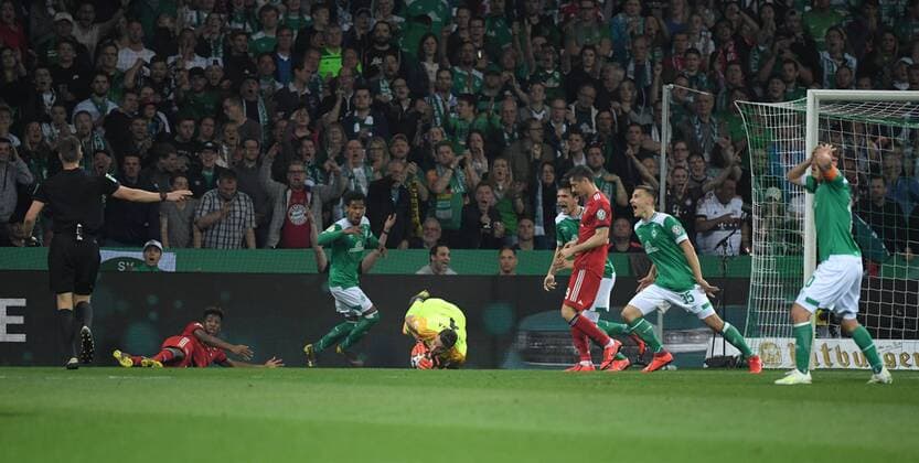 24 04 2019 Football GER Season 2018 2019 DFB Cup Semifinal SV Werder Bremen FC Bayern Muenchen 2 3 Referees Daniel Siebert left decides after a duel between Kingsley Coman Bayern Muenchen left and Theodor Gebre Selassie Werder Bremen 3 v left on penalty kick Bremen players are horrified DFB REGULATIONS PROHIBIT ANY USE OF PHOTOGRAPHS AS IMAGE SEQUENCES AND OR QUASI VIDEO Team2