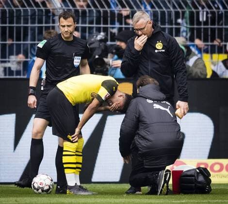 Dortmund 27 04 2019 Jadon Malik Sancho BvB is hit by an object during a goal celebration and injured in the face Borussia Dortmund FC Schalke 04