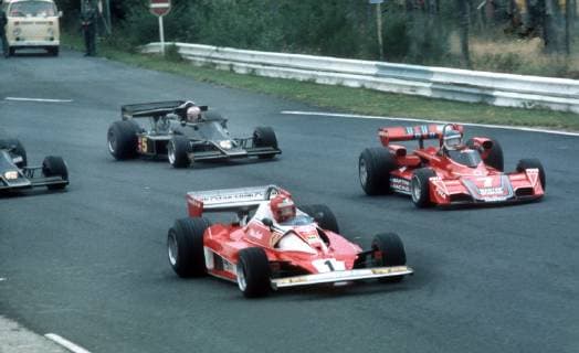 Formula 1 race Grand Prix of Germany at the Nürburgring on 01 08 1976 Niki Lauda Ferrari 1 is leading before his accident ahead of Carlos Reutemann 7 Brabham and Mario Andretti 5 Lotus HM