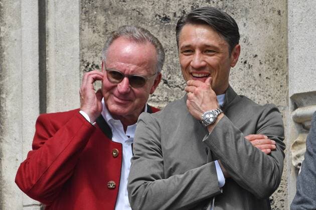 Niko KOVAC Coach Bayern Muenchen with Karl Heinz RUMMENIGGE, Chairman of the Board of FC Bayern Muenchen Master Celebration on the Town Hall Balcony Marienplatz in Muenchen on 26 05 2019 Football, Season 2018 19, DFB Cup Final RB Leipzig L FC Bayern Muenchen M 0 3