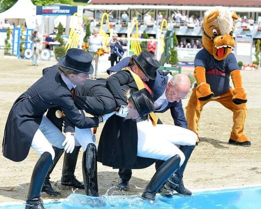Balve, Germany 16 06 2019, Longines Balve Optimum German Championships Dressage Grand Prix Kuer , The attempt to throw winner isabell Werth into the ditch fails Defodi 09 521 022352 Defodi-521