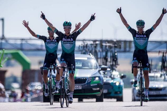 Maximilian Schachmann GER BORA hansgrohe becomes new German Champion in Road Cycling 2019 on the Sachsenring second Marcus Burghardt GER BORA hansgrohe and third Andreas Schillinger GER BORA hansgrohe finish finish arrival finish action action racing scene landscape horizontal event event German Championships road race elite men Sachsenring after to Sachsenring 181 1 km place location Sachsenring region Saxony Land Country Germany Date Date 30 06 2019 Stiehl Photography