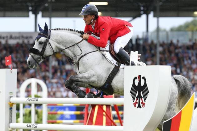 Christian Ahlmann GER with his horse Clintreyo Z after 3 years of abstinence in a Nations Cup has made his comeback after signing the athletes agreement in Aachen , Nations Cup , Mercedes Benz Nations Cup , Wanderpreis der Bundesrepublik Duetschland, Team Jumping Competition with two rounds , World Equestrian Festival, CHIO Aachen 2019, 12 21 07 2019, Aachener Soers, 18 07 2019
