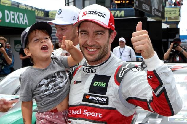 Mike Rockenfeller GER Audi Sport Team Phoenix Audi RS5 DTM is happy about his victory at the DTM race at the TT Circuit Assen NL Copyright Thomas Pakusch