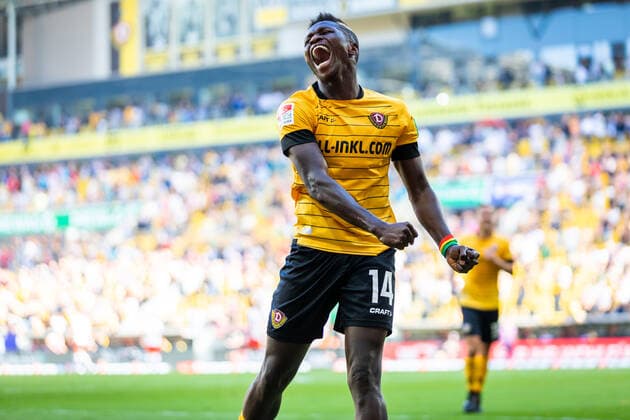 22 09 2019, Football, GER, Season 2019 2020, 2 Bundesliga, 7 Matchday, SG Dynamo Dresden SSV Jahn Regensburg Jubilation after the 2 1 winner for Dynamo Dresden In the picture Moussa Kone DFL REGULATIONS PROHIBIT ANY USE OF PHOTOGRAPHS AS IMAGE SEQUENCES AND OR QUASI VIDEO with Moussa Kone mi and Linus Wahlqvist DFL REGULATIONS PROHIBIT ANY USE OF PHOTOGRAPHS AS IMAGE SEQUENCES AND OR QUASI VIDEO