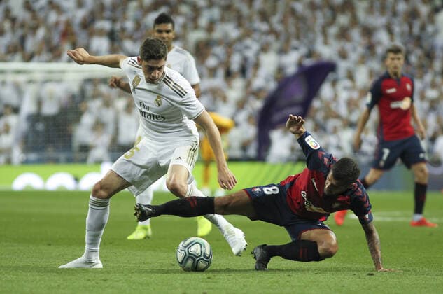 September 25, 2019, Madrid, Madrid, Spain: Valverde of Real Madrid and Lillo of Osasuna in action during La Liga Spanish championship football match between Real Madrid and Osasuna, September 25th, at Santiago Bernabeu stadium, in Madrid, Spain. Soccer: La Liga - Real Madrid v Osasuna - ZUMAa181 20190925_zaa_a181_157 Copyright: xAFP7x