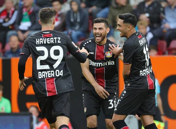 Goal celebration after the 2-0 by Kevin Volland Bayer 04 Leverkusen, middle , with Kai Havertz Bayer 04 Leverkusen and Nadiem Amiri Thelin Bayer 04 Leverkusen FC Augsburg vs. Bayer Leverkusen DFL REGULATIONS PROHIBIT ANY USE OF PHOTOGRAPHS AS IMAGE SEQUENCES AND OR QUASI VIDEO