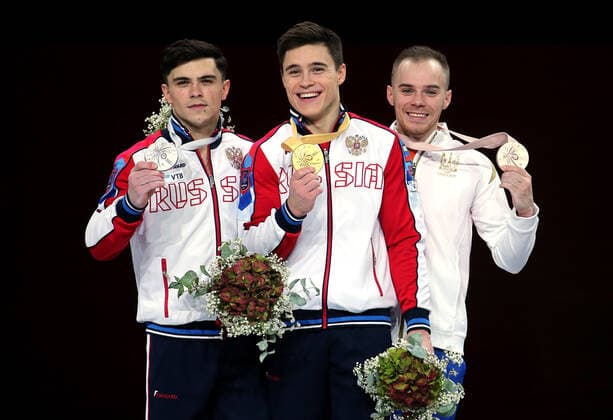11 10 2019 Germany, Stuttgart, World Championships Artistic Gymnastics 2019 Final All Around Men Award Ceremony, v l Artur Dalaloyan RUS, Place , Winner Nikita Nagornyy RUS , Oleg Verniaiev UKR, 3 Place