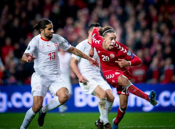 Denmarks Yussuf Yurary Poulsen and Ricardo Rodríguez at 1 0 during the European qualifying match between Denmark Switzerland in the Park Saturday, October 12, 2019, Copenhagen Denmark,  Copyright: Ritzau Scanpix LiselottexSabroex COP101 spdk20191012-202736-L